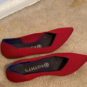 Rothys size 7 1/2. Never worn. Ruby red color